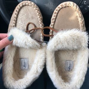 Women’s gold moccasin slippers